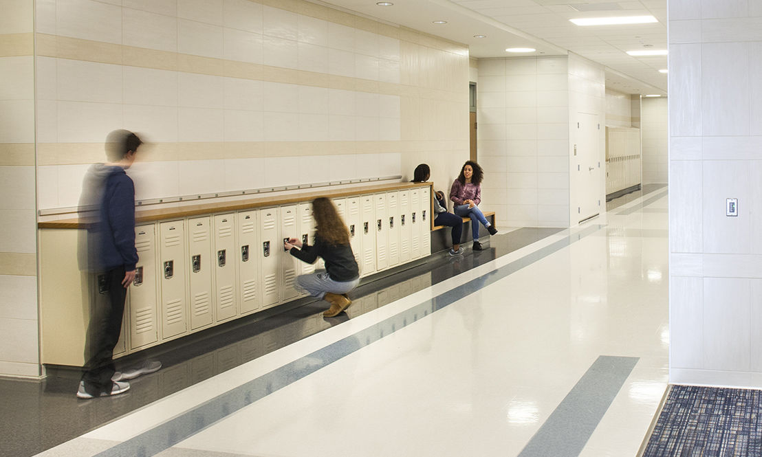 Hot Spots: Benches and high countertops in the corridors provide spaces for a quick chat or plug-in between class.
