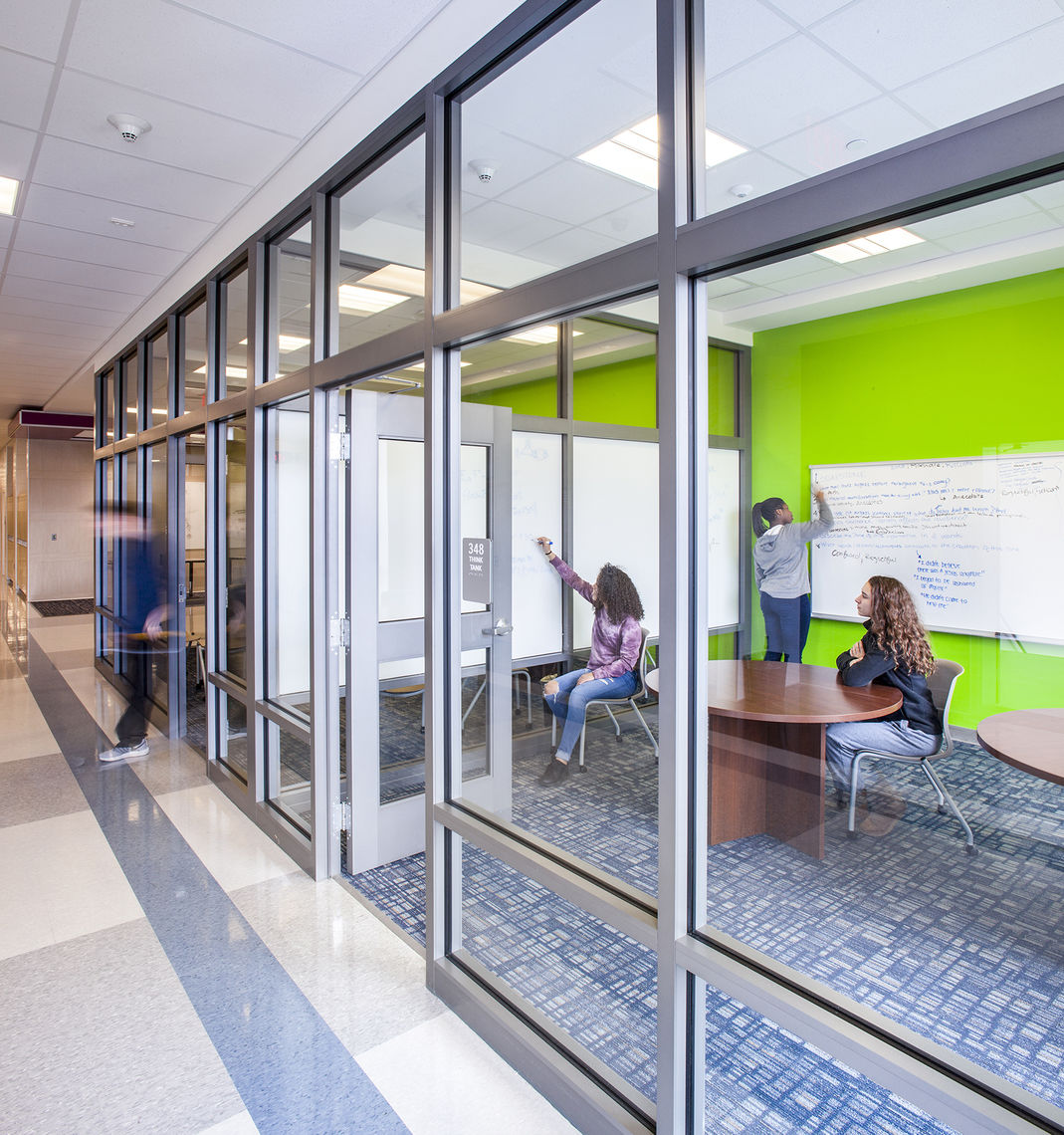 Think Tanks: Enclosed, but still visible spaces that support mixed-learning between departments, small group discussions, and group work.  Located in the academic corridors, these spaces are open to all departments and can accommodate up to 8 people.